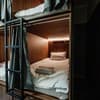 Отель Nesvit Capsule Hotel. Место в женском 8-местном номере  1
